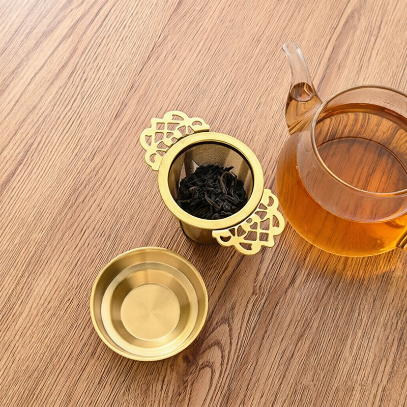 Gold 304 stainless steel tea infuser with lid and matching base for herbal tea Gold 304 stainless steel tea infuser with lid and matching base for herbal tea