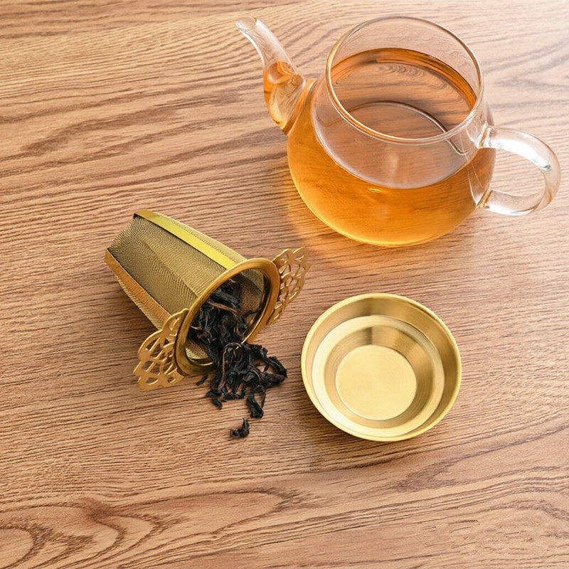 Gold 304 stainless steel tea infuser with lid and matching base for herbal tea Gold 304 stainless steel tea infuser with lid and matching base for herbal tea