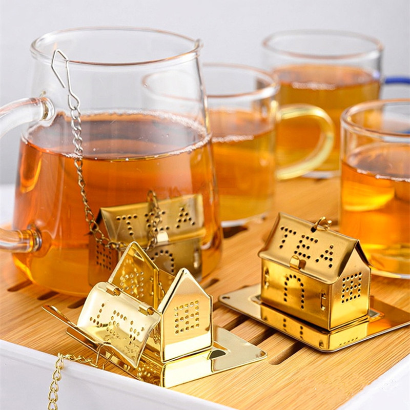 House shaped stainless steel tea infuser in various metallic finishes House shaped stainless steel tea infuser in various metallic finishes