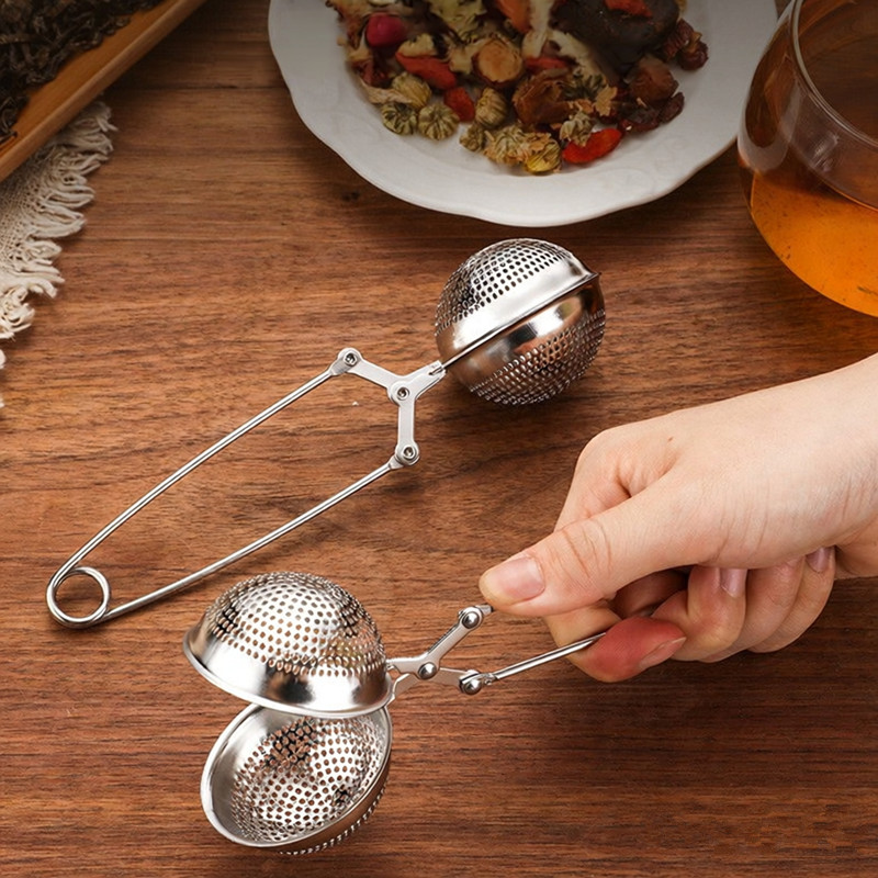 Premium stainless steel Bespoke Infuser Tea Ball with spring-handle for easy leaf loading Premium stainless steel Bespoke Infuser Tea Ball with spring-handle for easy leaf loading