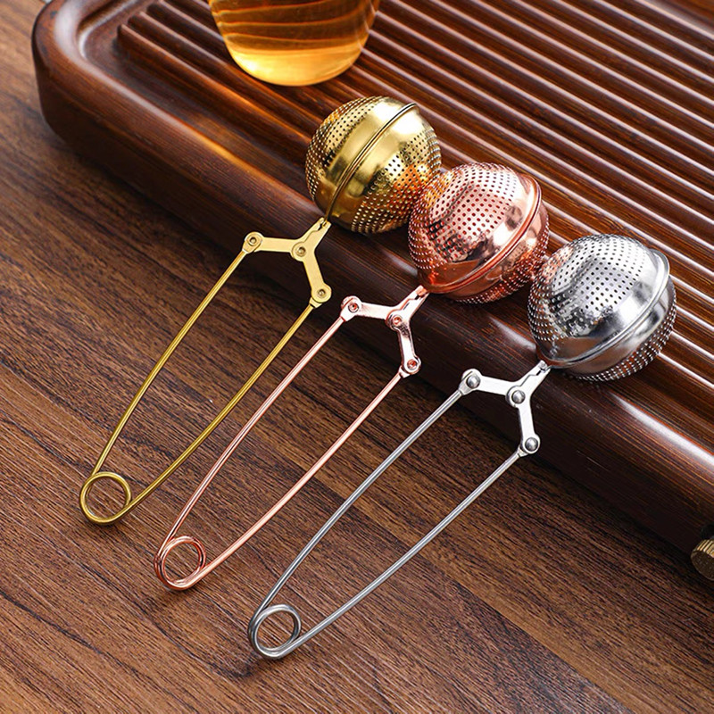 Premium stainless steel Bespoke Infuser Tea Ball with spring-handle for easy leaf loading Premium stainless steel Bespoke Infuser Tea Ball with spring-handle for easy leaf loading