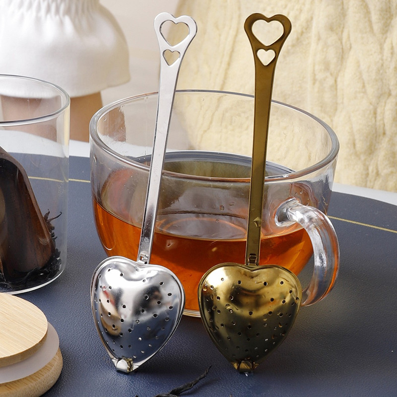 Premium stainless steel tea infuser with heart-shaped design for loose leaf tea Premium stainless steel tea infuser with heart-shaped design for loose leaf tea