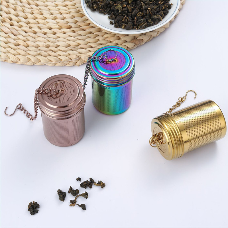 Stainless steel cylinder tea infuser basket with chain in rainbow, gold, and rose gold colors for loose leaf tea Stainless steel cylinder tea infuser basket with chain in rainbow, gold, and rose gold colors for loose leaf tea