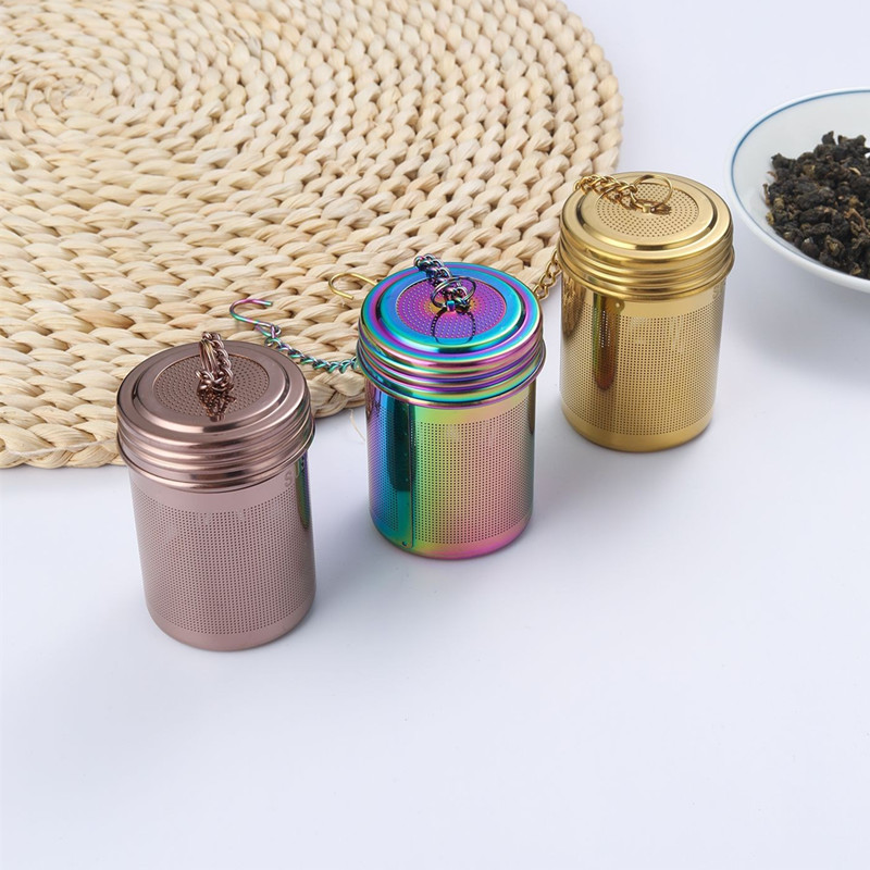 Stainless steel cylinder tea infuser basket with chain in rainbow, gold, and rose gold colors for loose leaf tea Stainless steel cylinder tea infuser basket with chain in rainbow, gold, and rose gold colors for loose leaf tea