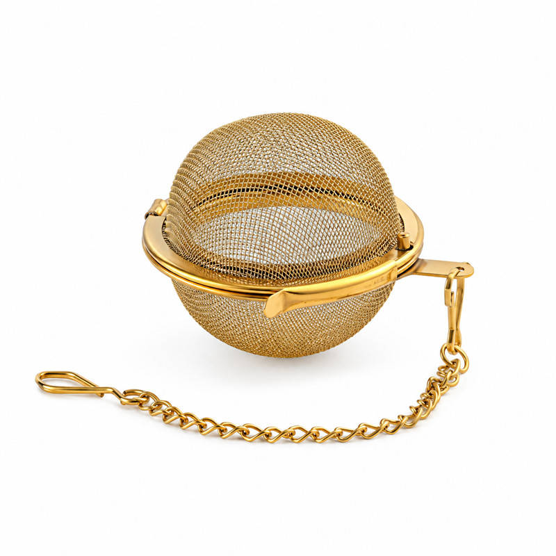 Gold tea infuser with fine mesh basket and decorative chain Gold tea infuser with fine mesh basket and decorative chain